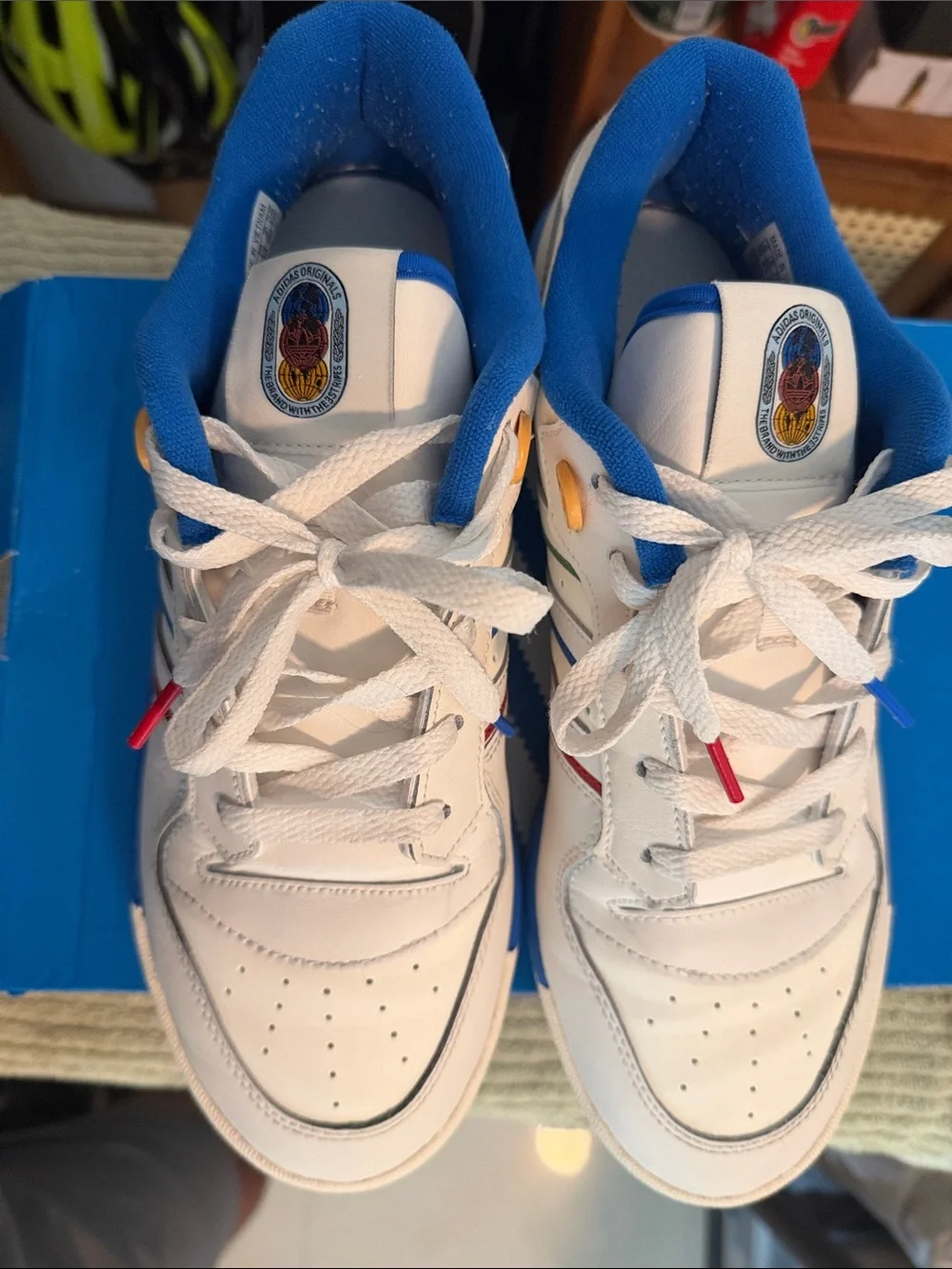 adidas Originals White Sneakers with Blue Lining and Multicolor Accents